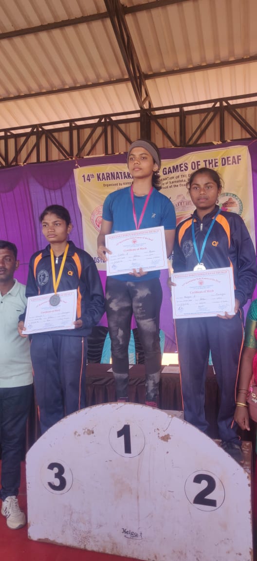 Rishitha with fellow medallists on a state-level podium
